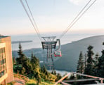 The Grouse Mountain gondola arrives at the top of Grouse Mountain
