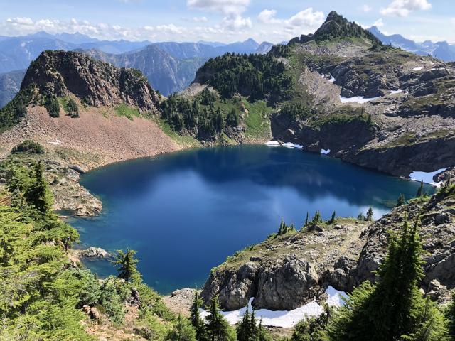 Looking down from the slopes of Macfarlane at my adventure buddies admiring the jewel that is Upper Pierce Lake