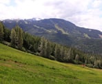 A view looking towards Whistler Mountain from the Ascent Trail on Blackcomb