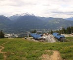 A view looking down at the Wizard and Solar Coaster chairlifts along the Ascent Trail on Blackcomb