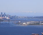 The view of the Ironworkers Memorial Bridge and downtown Vancouver from Belcarra Bluffs