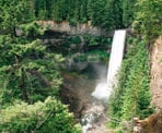 Another view of water rushing over the cliff at Brandywine Falls south of Whistler, BC