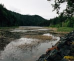 The view of Brohm Lake near the wooden bridge and alongside the Sea To Sky Highway