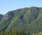 View of the Grouse Mountain Gondola from Cleveland Dam