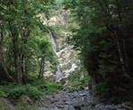 The first view of Flood Falls from the forest near Hope, BC