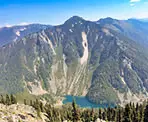 Looking across Lindeman Lake at Flora Peak from Goat Ridge