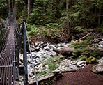 The metal suspension bridge near Norvan Falls that takes you into the backcountry