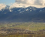 The view of the valley between the trees from Hillkeep Regional Park