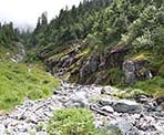 A steep climb up a rocky trail from the Howe Sound Crest Trail to the top of Mount Strachan