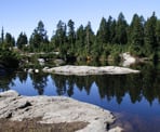 A view of Mystery Lake from the large rocks in the water