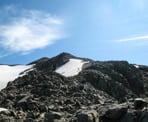 The trail to Panorama Ridge climbs up the loose rock where snow lingers well into the summer