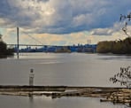 The Port Mann Bridge crossing the Fraser River, visible in the distance from the Pitt River Regional Greenway
