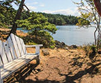 A wooden bench in Roesland on Pender Island