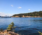 A view from Roesland of the ferry arriving at Pender Island