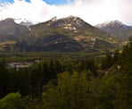 A viewpoint looking west across Squamish to the mountain ranges in the distance