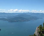 The view of Howe Sound and the lookout on the rocky cliff from St Mark&#39;s Summit