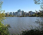 A view of Lost Lagoon and the water fountain on the edge of downtown Vancouver